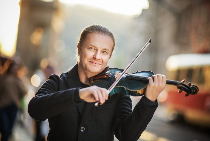 A man playing a violin