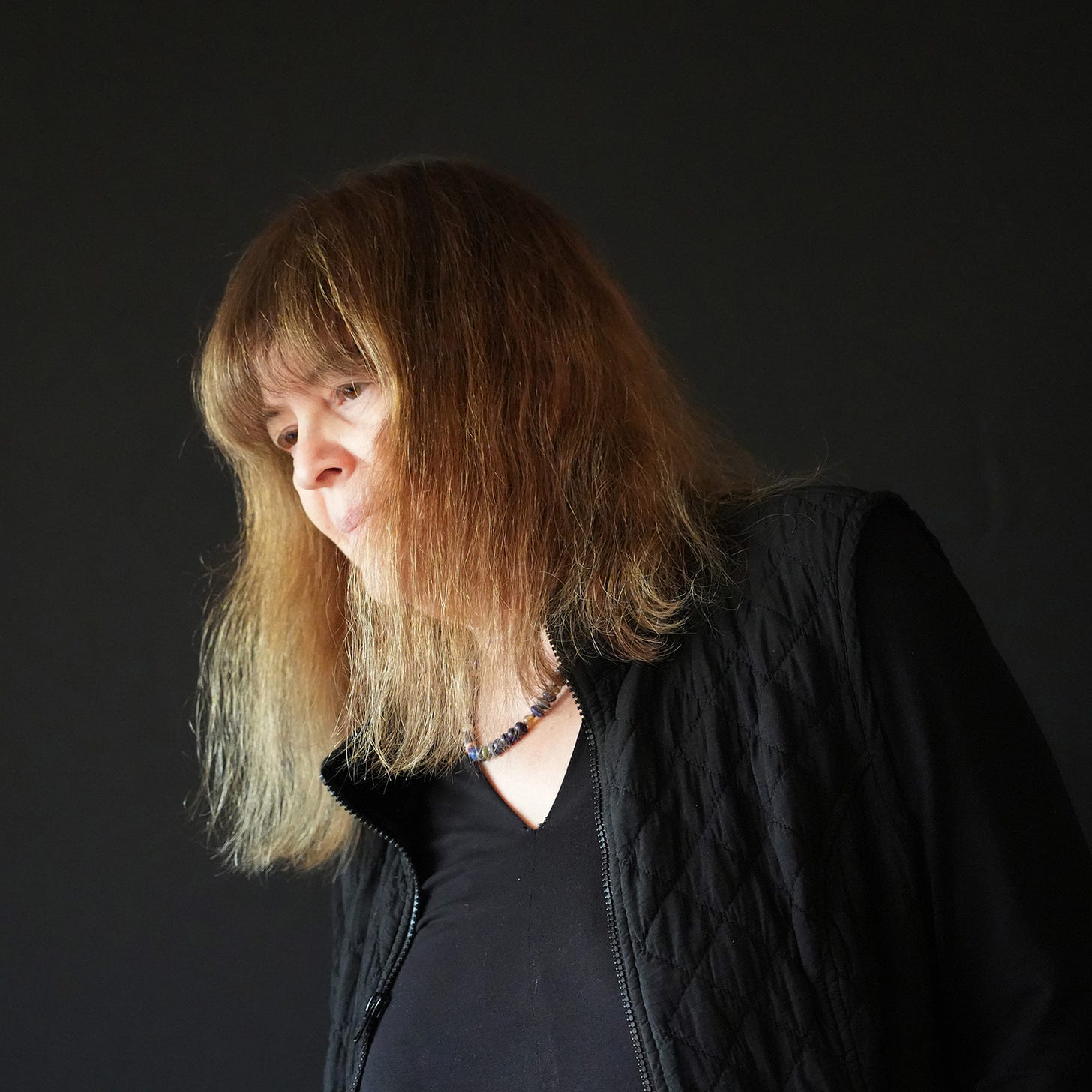 Marilyn Crispell looking down and away from the camera