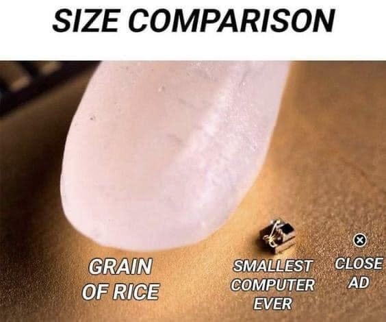 May be an image of text that says 'SIZE COMPARISON GRAIN OF RICE CLOSE AD SMALLEST COMPUTER EVER'