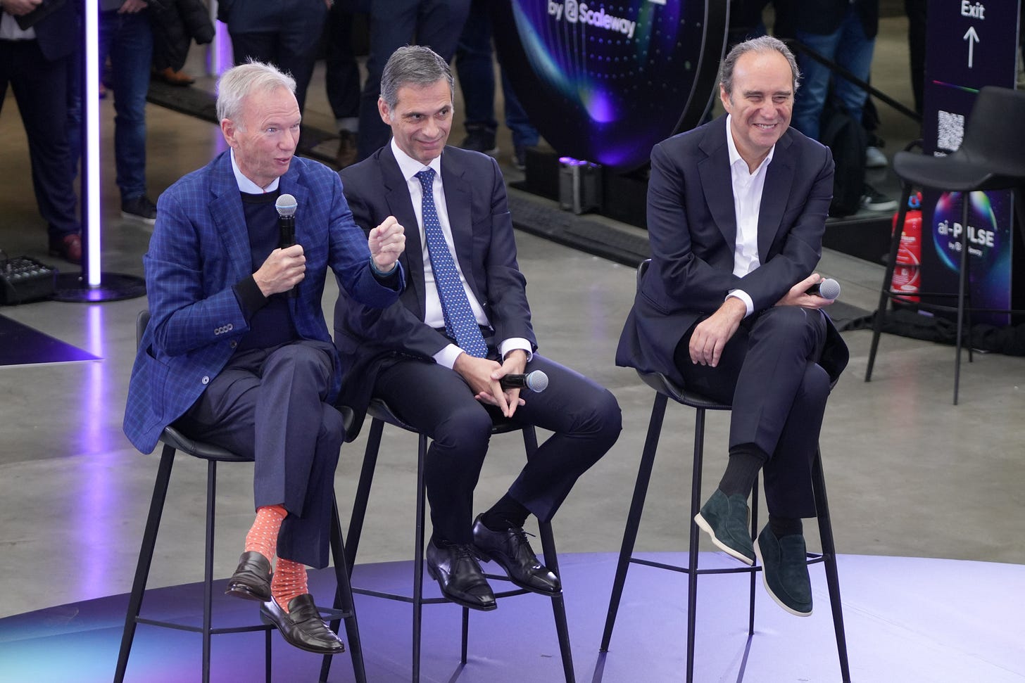Billionaires Eric Schmidt, left, Rodolphe Saade, center, and Xavier Niel, at ai-Pulse on Nov. 17.