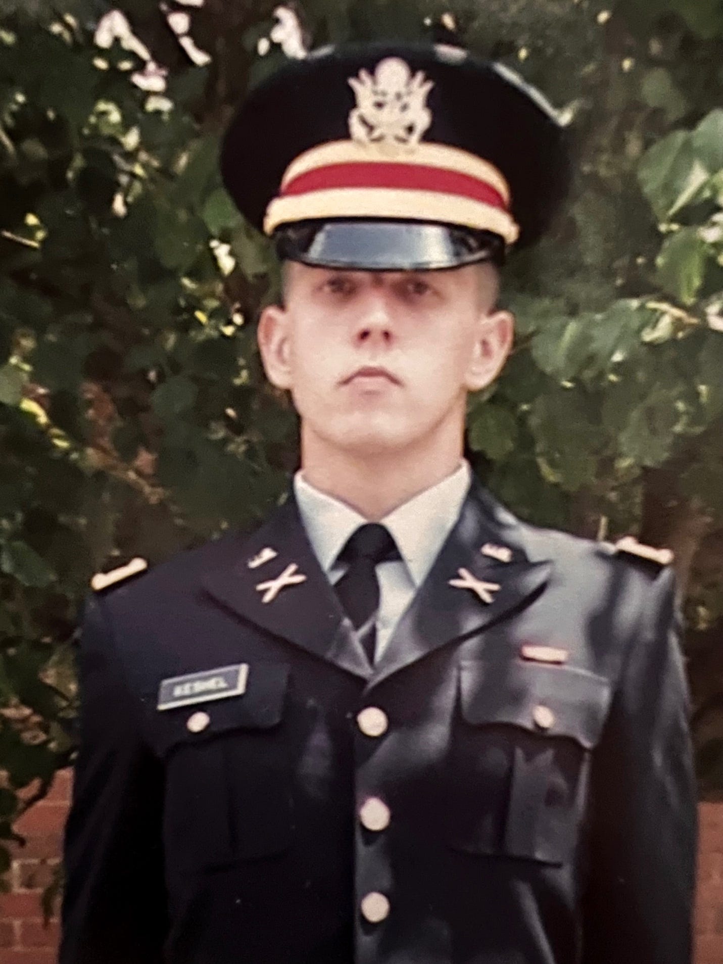 A person in a military uniform

Description automatically generated with medium confidence
