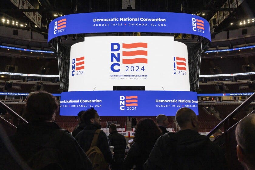 The logo for the 2024 Democratic National Convention is displayed on the scoreboard during the DNC Winter Media Walkthrough at the United Center, Thursday, Jan. 18.