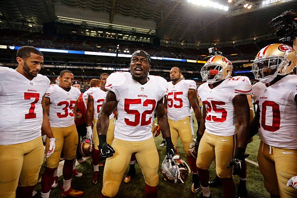 Patrick Willis of the San Francisco 49ers fires up the team on the field prior to the game against the St. Louis Rams at the Edward Jones Dome on...