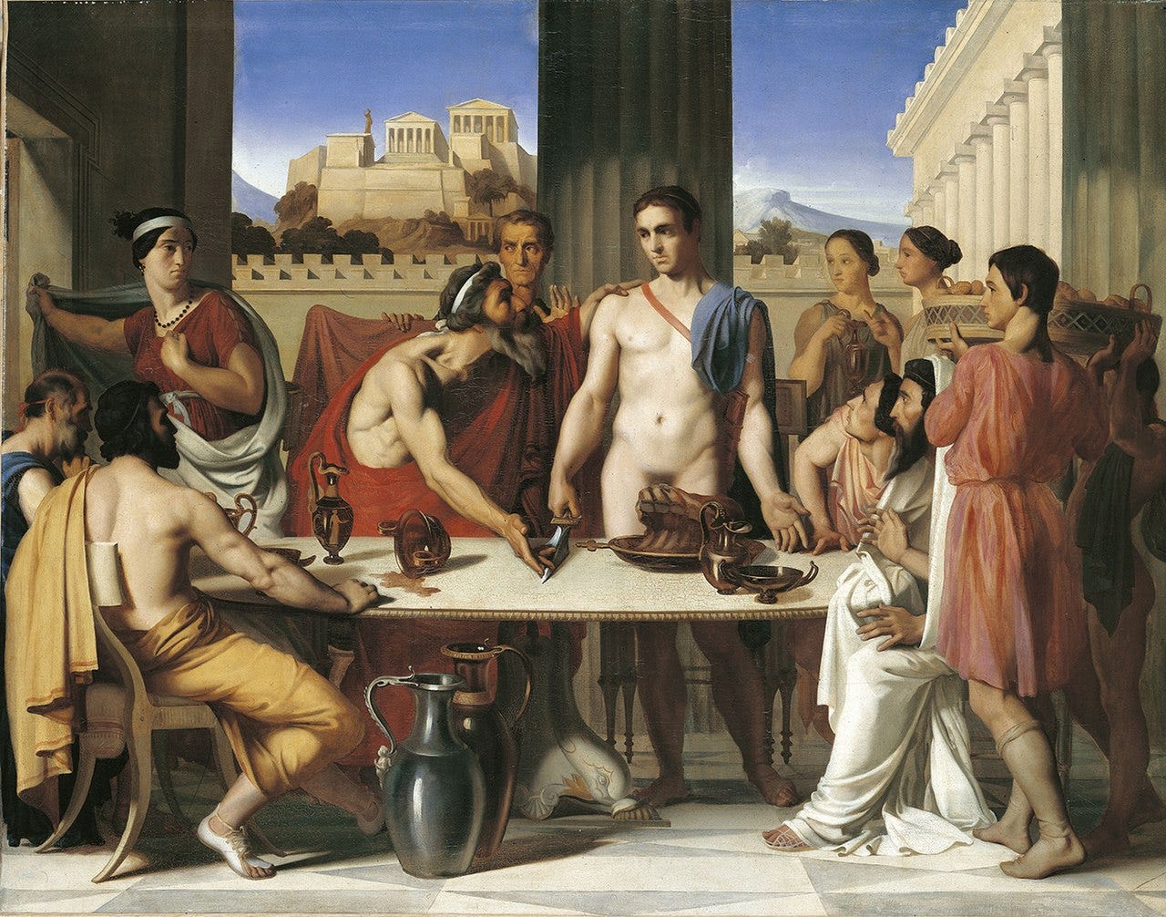 A imagem apresenta gregos reunidos em volta de uma mesa com Egeu e Teseu ao centro da mesa. Teseu está seminu e possui corpo atlético.