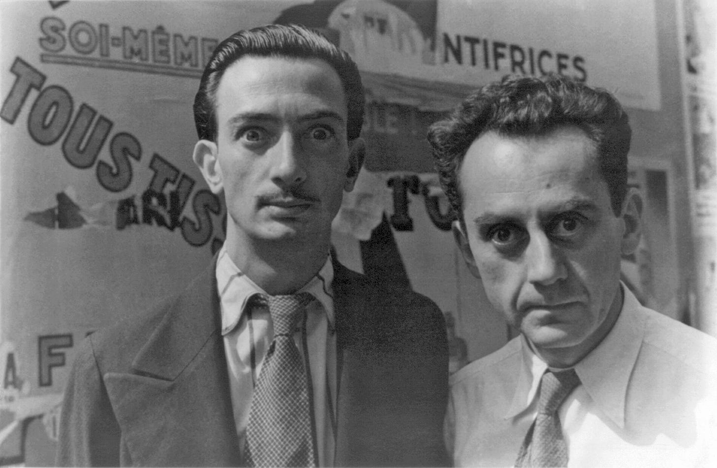 Salvador Dalí and Man Ray in Paris, on June 16, 1934, making "wild eyes" for photographer Carl Van Vechten