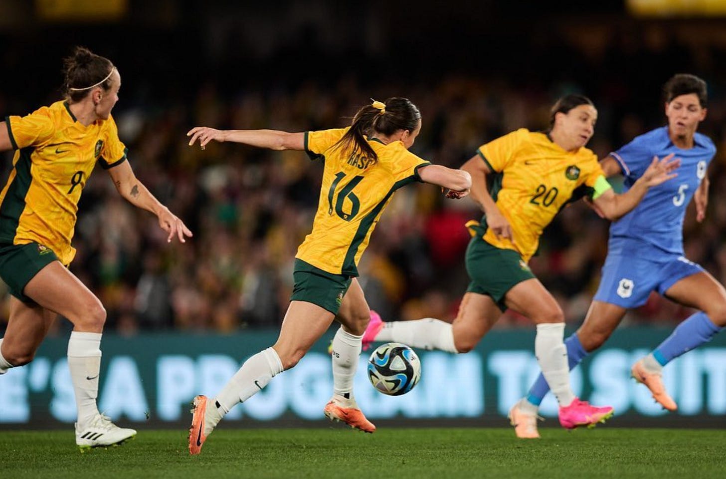 Hayley Raso races with the ball while playing for Australia in the 2023 Women's World Cup