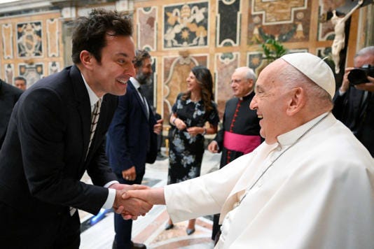Jimmy Fallon could be seen saying “thank you” to Pope Francis at the event. via REUTERS