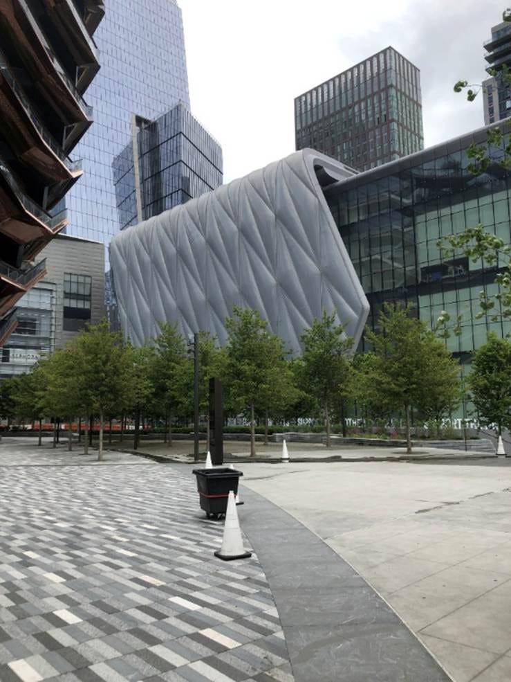 A city with trees and buildings

AI-generated content may be incorrect.