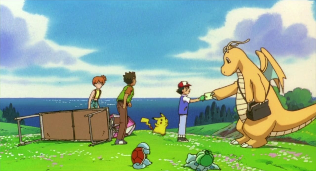 A scene from the first Pokémon movie where Dragonire hands Ash an invitation