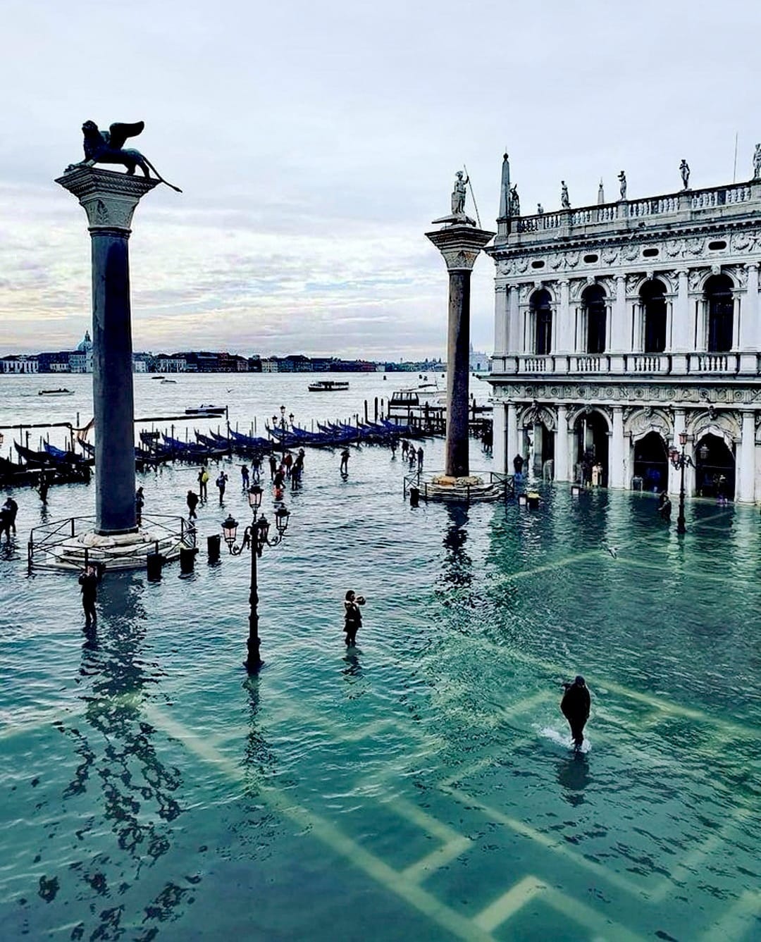 May be an image of 3 people, The Trevi Fountain and bell tower