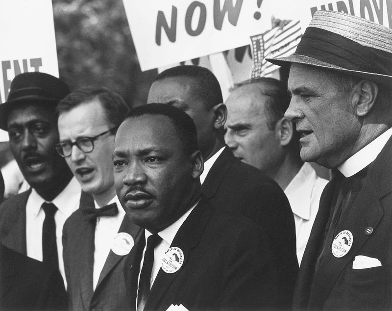 Black & white photo of Dr. Martin Luther King and other Civil Rights leaders at the 1963 March on Washington