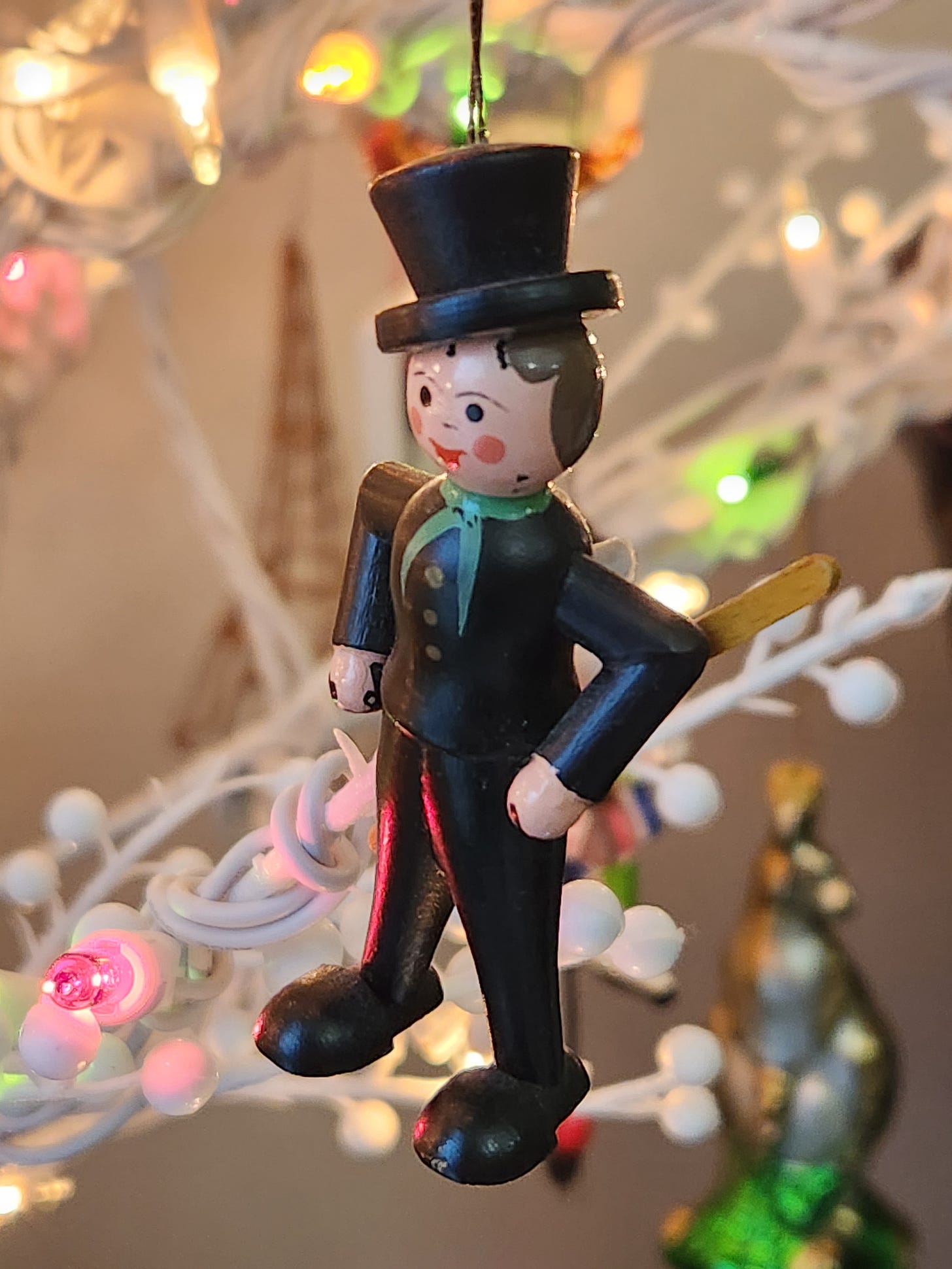 Wooden Christmas tree ornament of a Chimney Sweep.