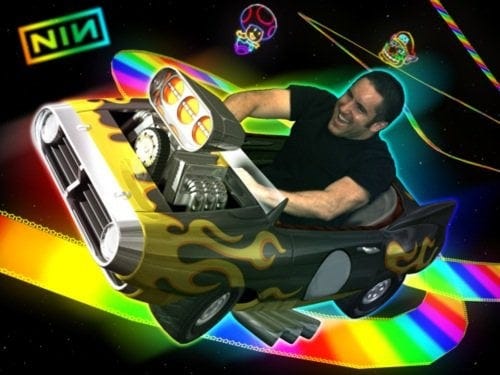 So...here's Trent Reznor driving a mini hotrod down Rainbow Road... :  r/funny