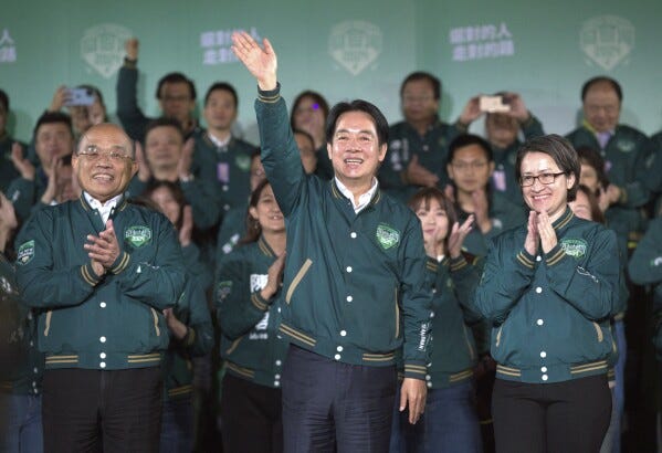 Taiwanese Vice President Lai Ching-te, also known as William Lai, center, celebrates his victory with running mate Bi-khim Hsiao, right, and supporters in Taipei, Taiwan., Saturday, Jan. 13, 2024. Ruling-party candidate Lai Ching-te has emerged victorious in Taiwan''s presidential election and his opponents have conceded. The result in Taiwan''s presidential and parliamentary election will chart the trajectory of relations with China over the next four years. (AP Photo/Chiang Ying-ying)