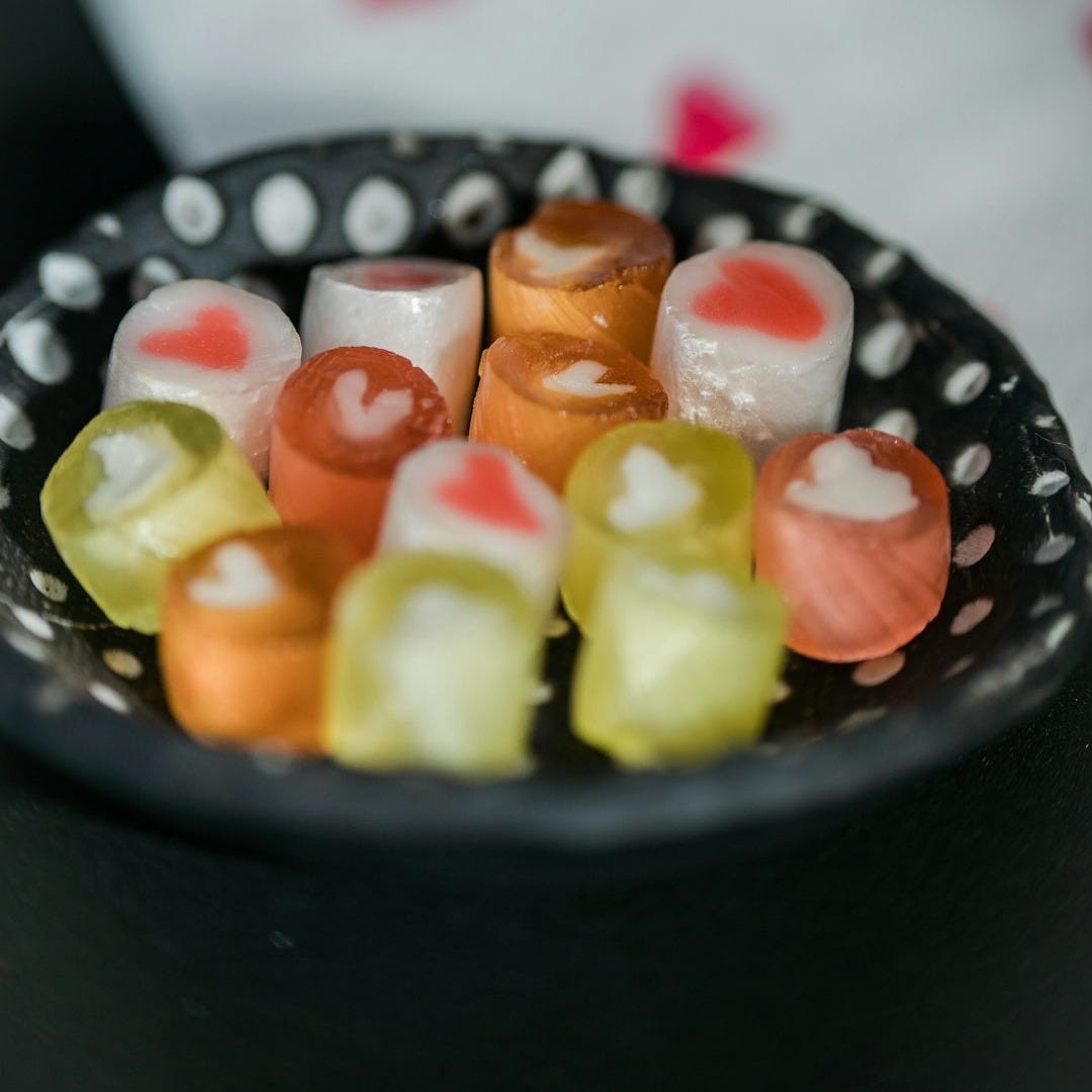 sliced fruits on black ceramic bowl sliced fruits on black ceramic bowl