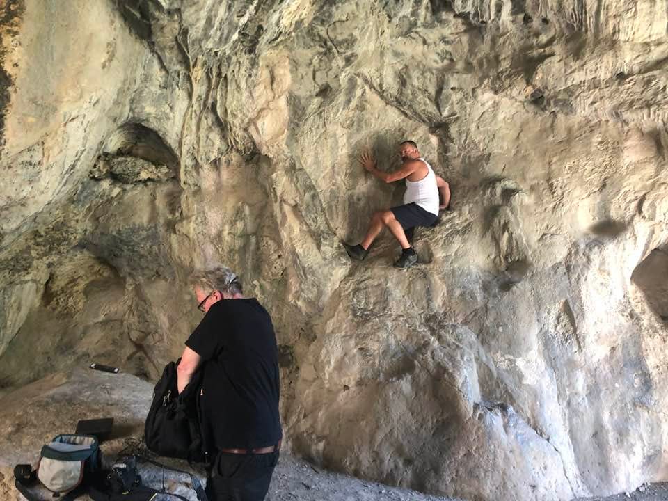 May be an image of 2 people and people climbing