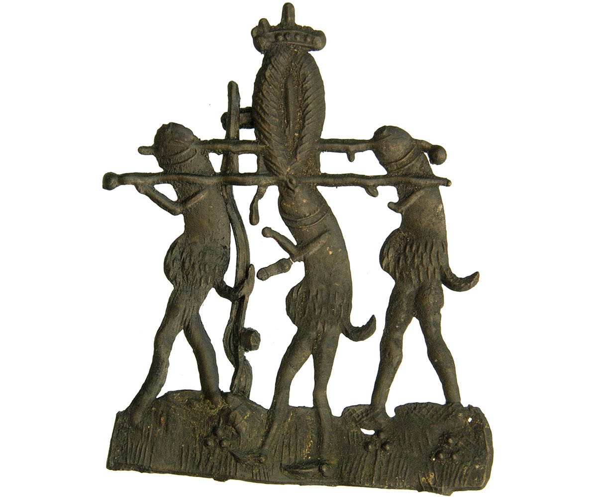 A medieval lead-tin badge featuring penises carrying a vulva A medieval lead-tin badge featuring penises carrying a vulva