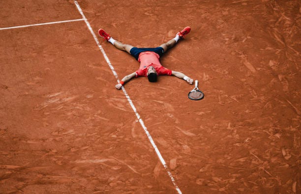 Novak Djokovic of Serbia celebrates after the Men's Singles Final match against Casper Ruud of Norway on Day Fifteen of the 2023 French Open at...