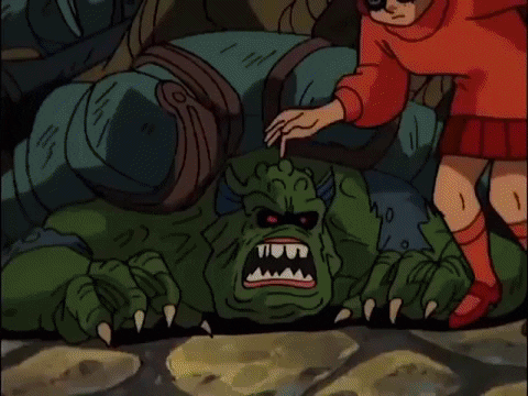 gif from Scooby Doo animated series in which several men are unmasked one after another