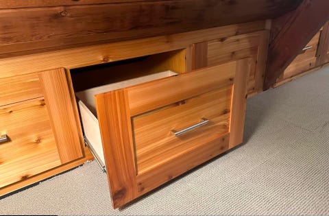 An open cedar drawer