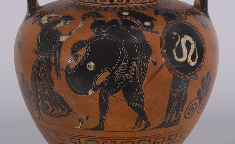 The death of Achilles, which occurred after the events recounted in "The Iliad," was described in another epic poem called "The Aethiopis", which has not survived. On the front of this amphora, the dead Achilles is carried from the Trojan battlefield by his comrade, Ajax. In front of Ajax, a woman leads the way and raises her hand to tear at her hair in a gesture of mourning. Two armed warriors follow behind. On the back, two armed horsemen clash on the battlefield, their horses rearing above a fallen warrior trapped beneath them.