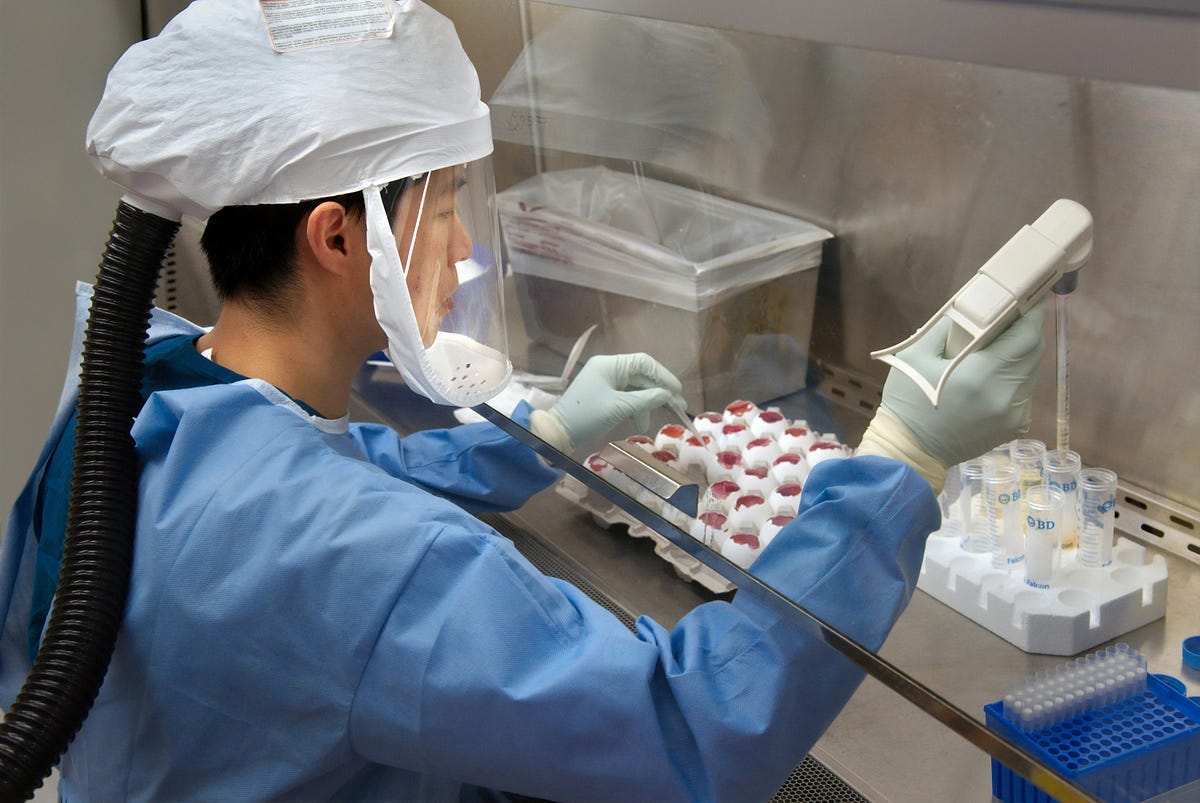 Research scientist working in lab.