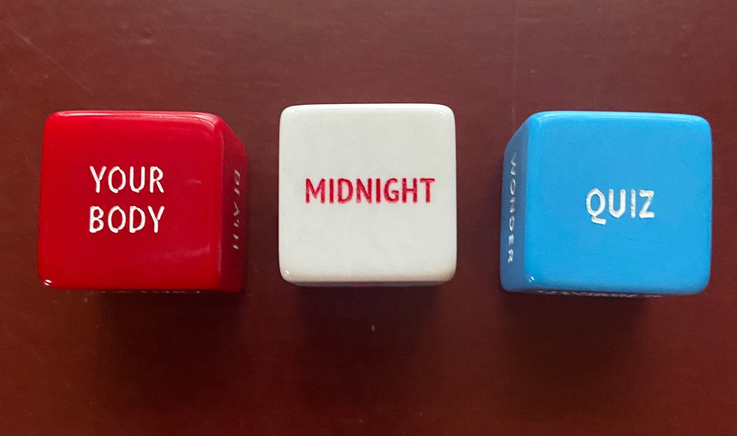 A red dice says, YOUR BODY, a white dice says, MIDNIGHT, and a blue dice says, QUIZ
