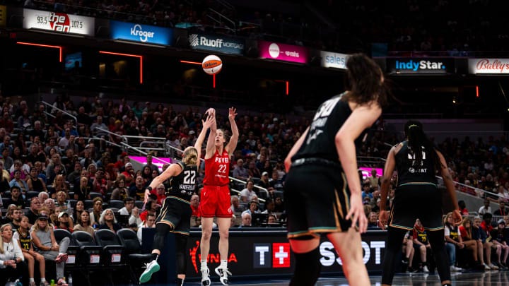 Indiana Fever guard Caitlin Clark (22) shoots a 3-pointer Saturday, July 6, 2024, during the game at Gainbridge Fieldhouse in Indianapolis.