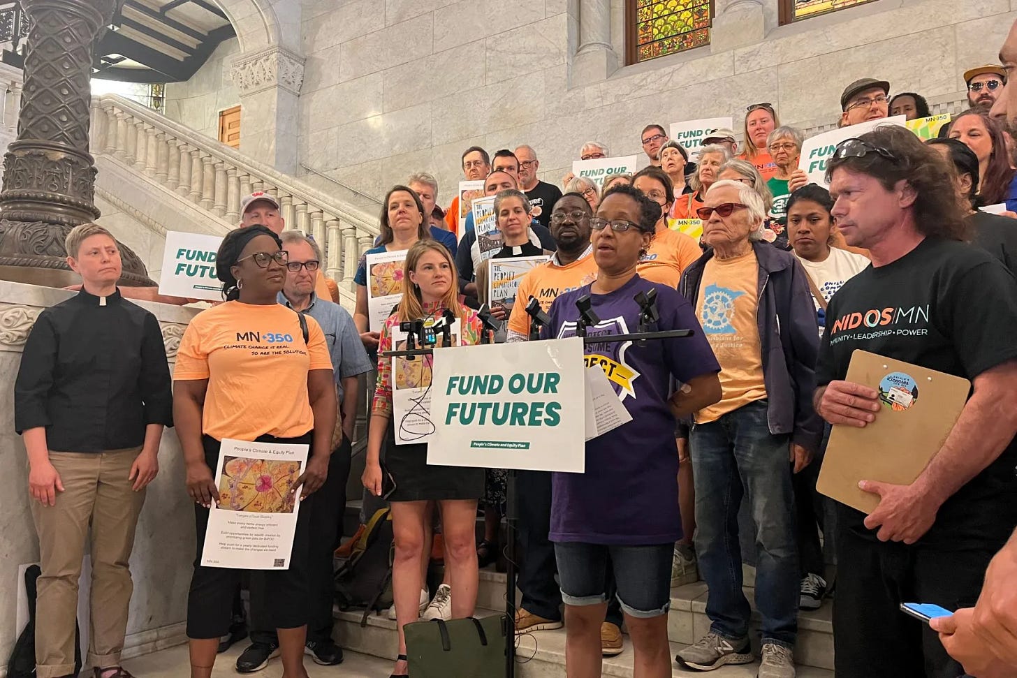 Unidos MN, speaking at their “Fund Our Futures” climate rally in 2023.