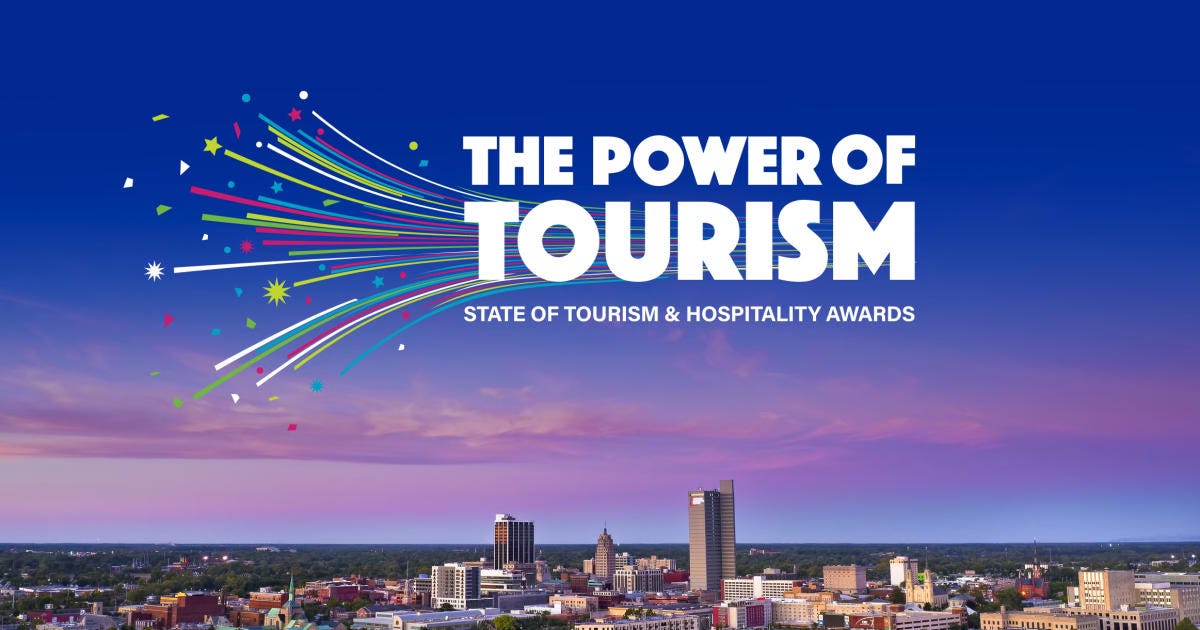 Power of Tourism awards logo overlayed on Fort Wayne skyline at sunset.