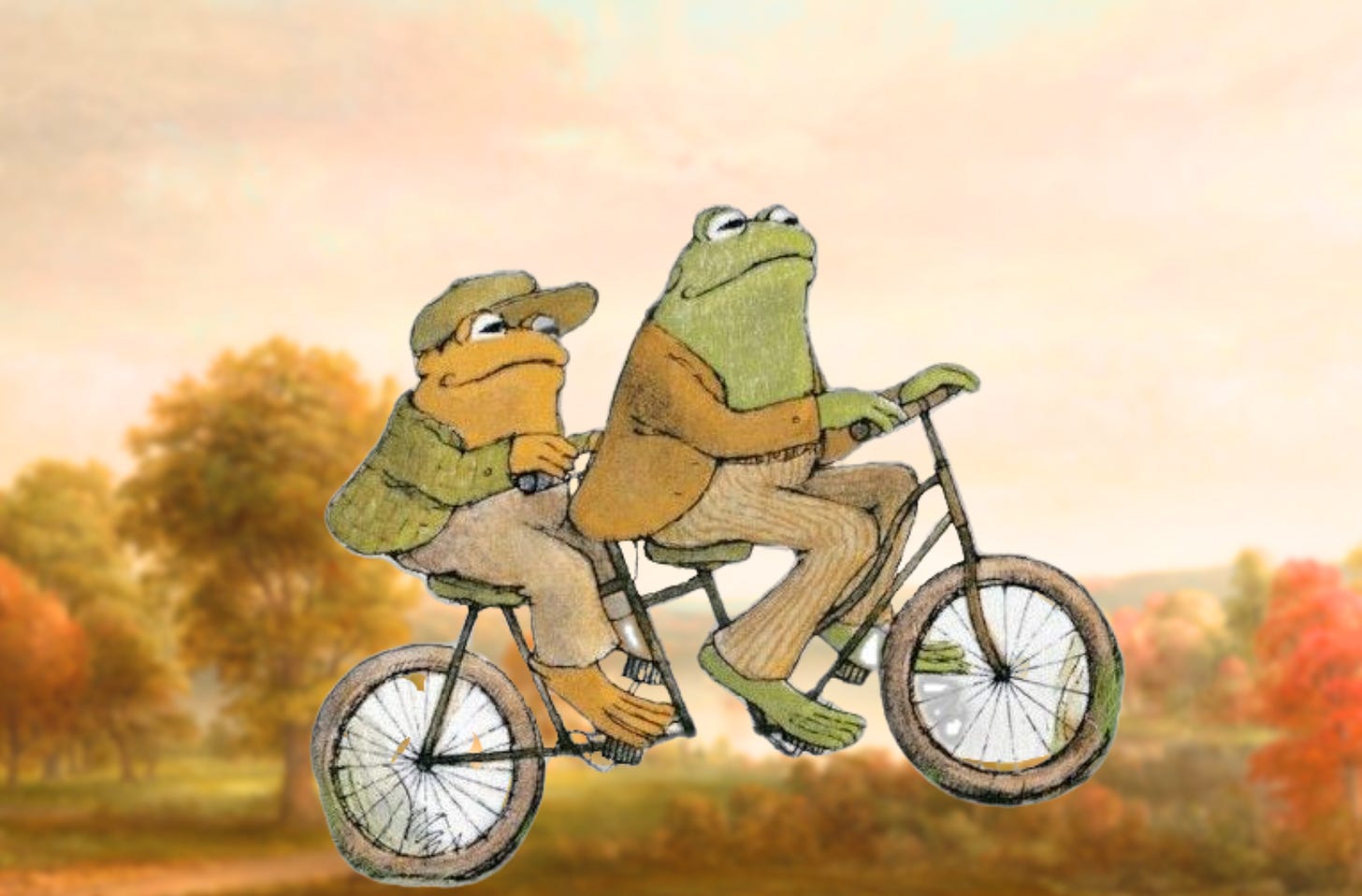 the children's book characters frog and toad – a small yellow frog in a green tweed jacket and a green frog in pinstripe pants – riding a two-seater tandem bike against a blurry backdrop with autumnal red and orange trees