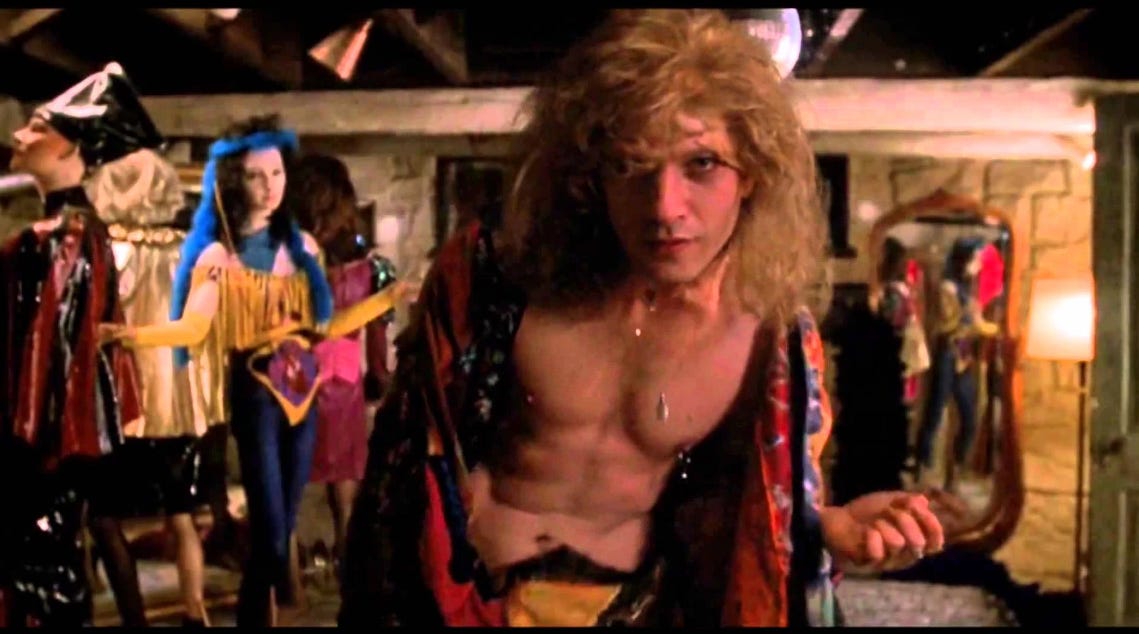 Buffalo Bill, from Silence of the Lambs, dances to their own reflection.
