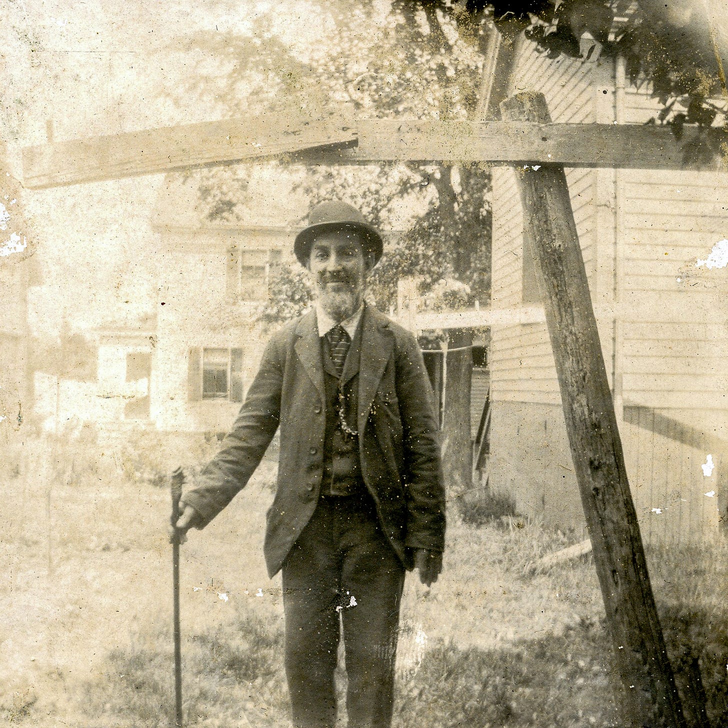 Man with hat and walking stick