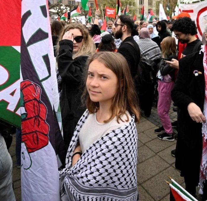 Oli London on X: "Greta Thunberg drapes herself in a Keffiyeh as she joins  huge antisemitic mob protesting outside the Eurovision venue in Malmo,  Sweden. The eco activist, who has been accused
