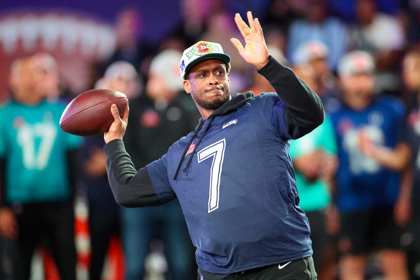 Feb 1, 2024; Orlando, FL, USA; Seattle Seahawks quarterback Geno Smith (7) participates in the NFL Pro Bowl Skills Competition at the UCF NIcholson Fieldhouse.