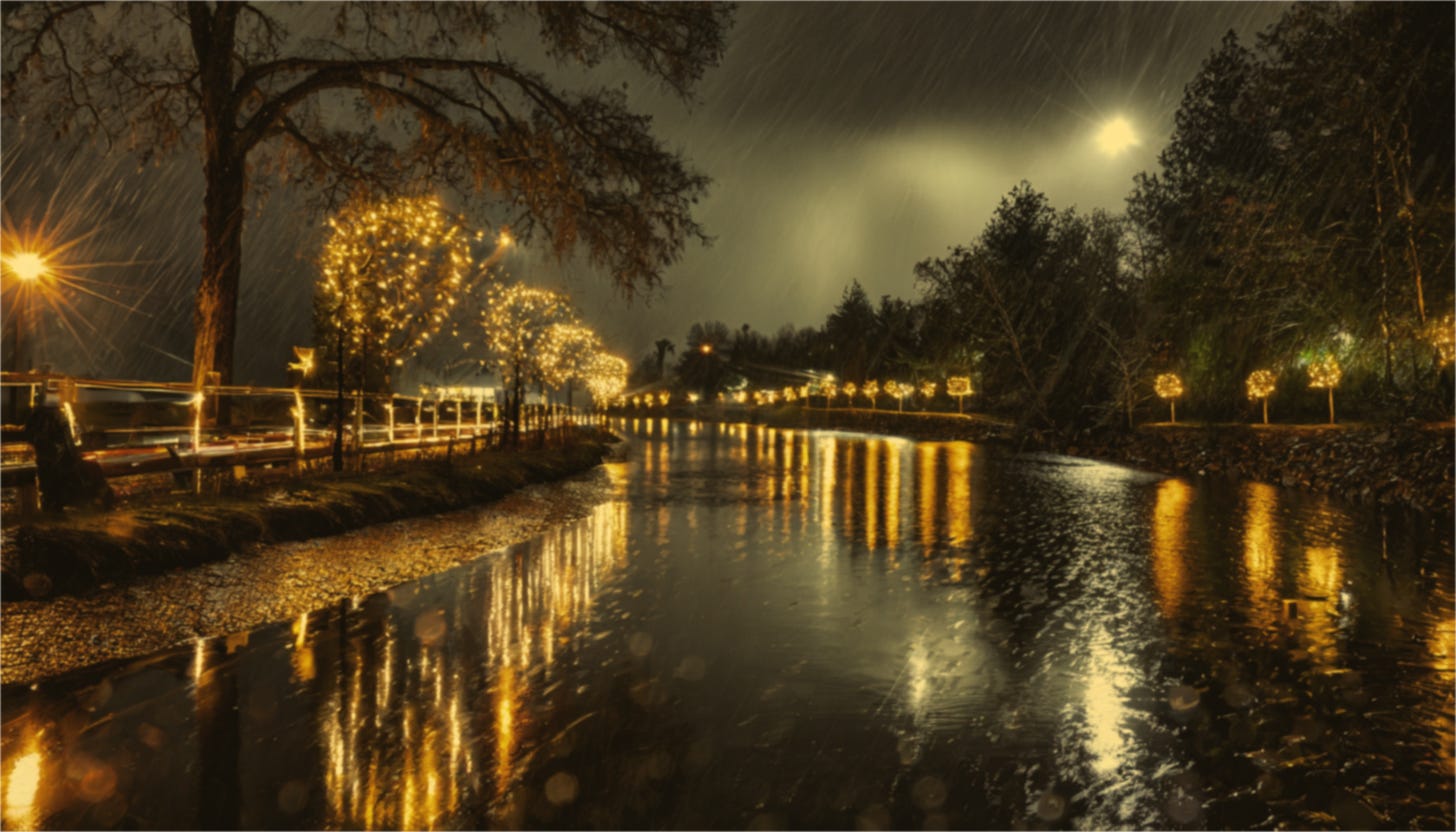 Rain falls from stormy skies into a river illuminated with reflections from trees filled with golden lights along its edges.