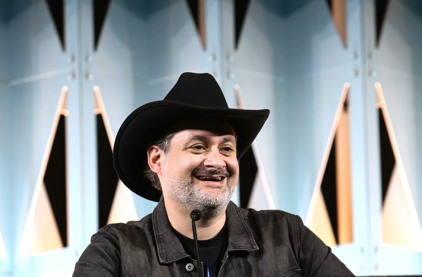 Dave Filoni attends the panel for The Mandalorian series at Star Wars Celebration in Anaheim, California on May 28, 2022