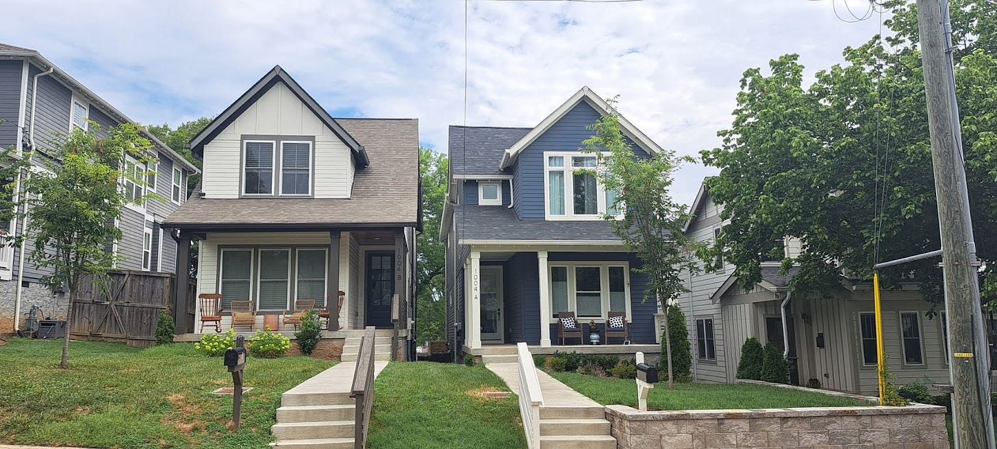 Two small homes sitting side-by-side on what used to be a single lot.