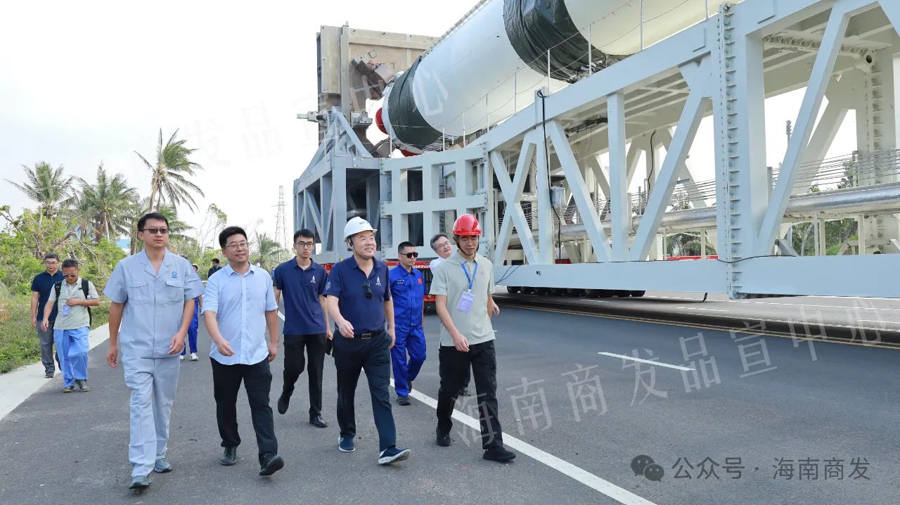 Part of the Wenchang Commercial Space Launch Site team with the Long March 12 Y1 vehicle during transportation.