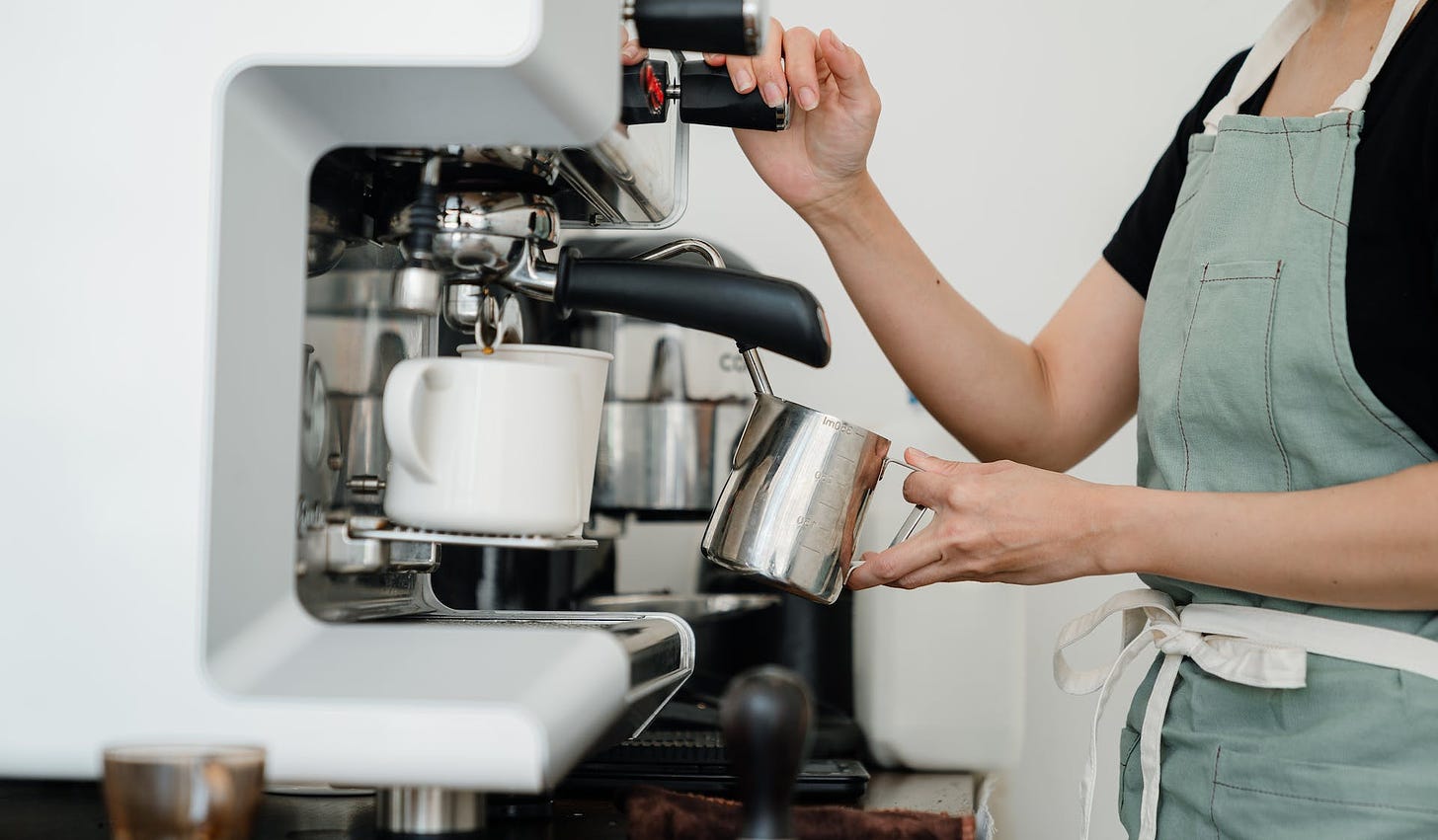 Photo by Ketut Subiyanto: https://www.pexels.com/photo/crop-young-woman-whipping-milk-using-professional-machine-in-coffee-shop-4349954/