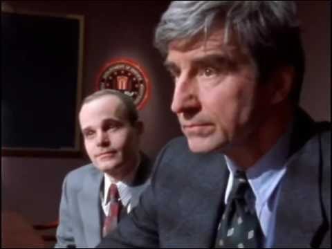 This still image from "Sideshow (Part 2)," the fifteenth episode of Homicide: Life on the Street's seventh season, shows Maryland Assistant State's Attorney Ed Danvers (played by Želko Ivanek, left) and New York Assistant District Attorney Jack McCoy (Sam Waterston, right) sitting in the office of Independent Counsel William Dell. This still image from "Sideshow (Part 2)," the fifteenth episode of Homicide: Life on the Street's seventh season, shows Maryland Assistant State's Attorney Ed Danvers (played by Želko Ivanek, left) and New York Assistant District Attorney Jack McCoy (Sam Waterston, right) sitting in the office of Independent Counsel William Dell.