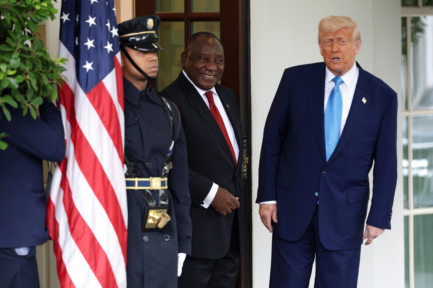 WASHINGTON, DC - MAY 21: U.S. President Donald Trump (R) greets President of South Africa Cyril Ramaphosa as he arrives to the White House on May 21, 2025 in Washington, DC. Relations between the two countries have been strained since Trump signed an executive order in February that claimed white South Africans are the victims of government land confiscation and race-based “genocide” while admitting some of those Afrikaners as refugees to the United States. Trump also halted all foreign aid to South Africa and expelled the country’s Ambassador to the U.S. Ebrahim Rasool. (Photo by Alex Wong/Getty Images)