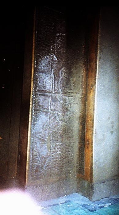 Photo of metal plate of Father Crespi’s Collection used to line walls.