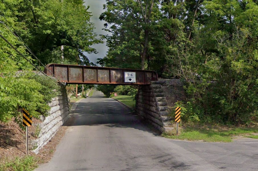 Utility truck collides with rail bridge in Shortsville, knocking it off  foundation | Fingerlakes1.com