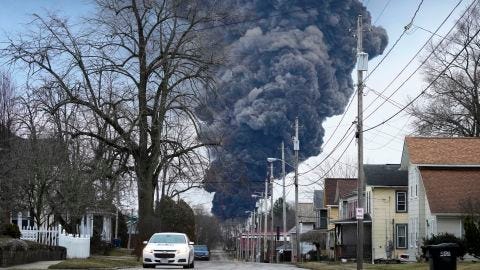 A black plume rises over East Palestine, Ohio, due to the controlled detonation of a portion of the derailed Norfolk Southern train on Feb. 6, 2023.