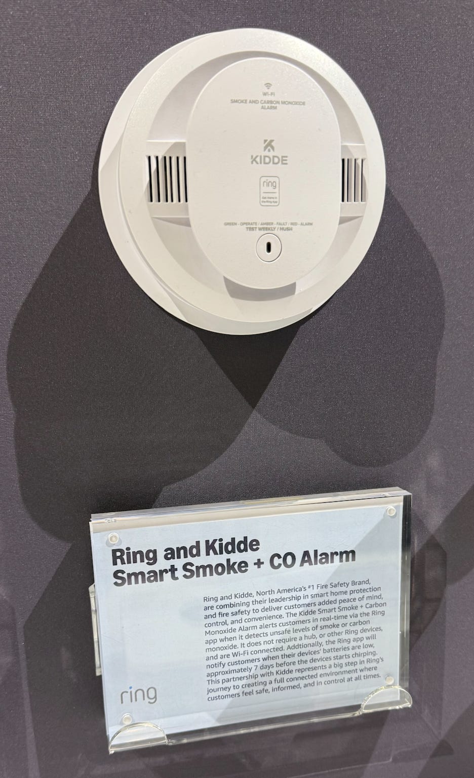 A smoke detector on a wall

Description automatically generated