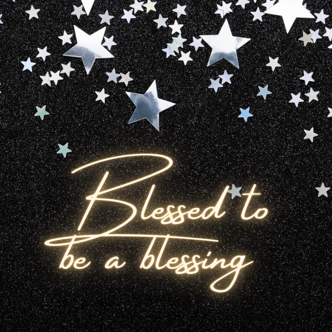 Glowing text reads "Blessed to be a blessing" against a dark background with silvery stars