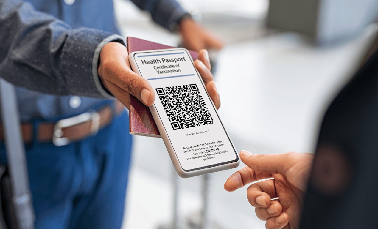 A person holding a passport and a qr code

Description automatically generated