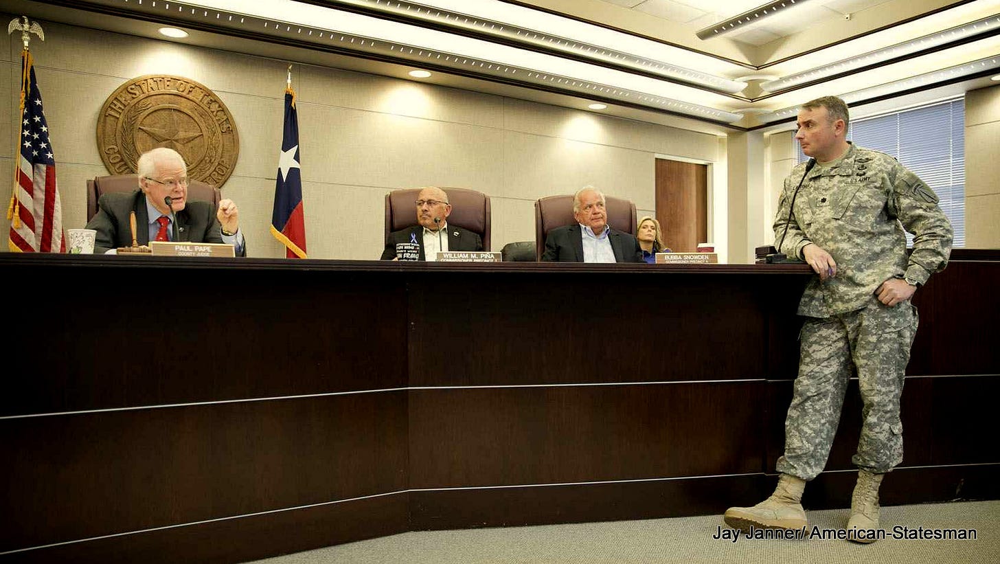 Lt. Col. Mark Lastoria, of the U.S. Army Special Operations Command, answers questions at a public hearing about the Jade Helm 15 military training exercise at the Bastrop County Commissioners Court in Bastrop on Monday April 27, 2015. An overflow crowd came to the meeting to hear a presentation and ask questions of Lastoria about the controversial military exercise that will take place in several states this summer. 