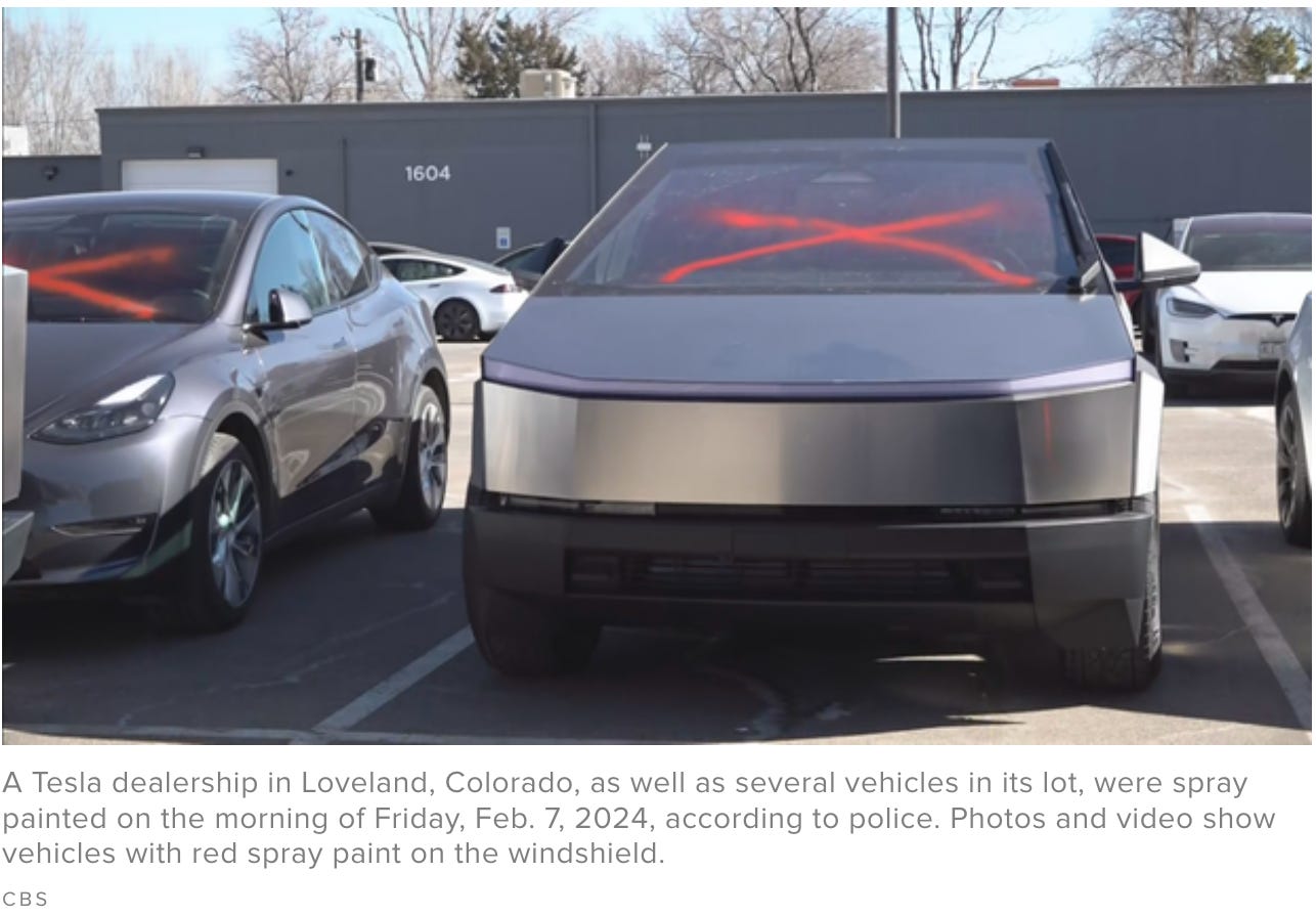 A Tesla dealership in Loveland, Colorado, as well as several vehicles in its lot, were spray painted on the morning of Friday, Feb. 7, 2024, according to police. Photos and video show vehicles with red spray paint on the windshield. A Tesla dealership in Loveland, Colorado, as well as several vehicles in its lot, were spray painted on the morning of Friday, Feb. 7, 2024, according to police. Photos and video show vehicles with red spray paint on the windshield.
